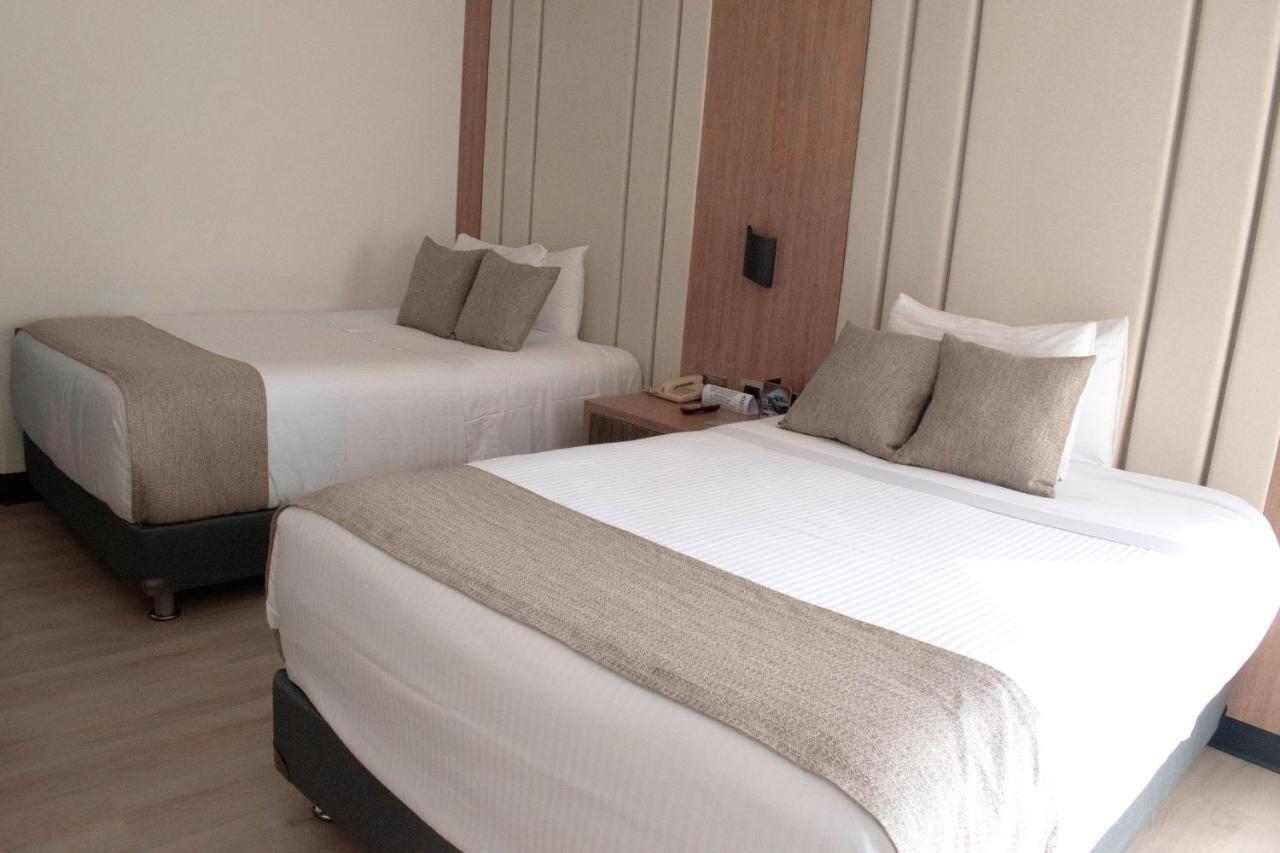 Hotel Dann Carlton Belfort Medellín Eksteriør billede A room at the hotel