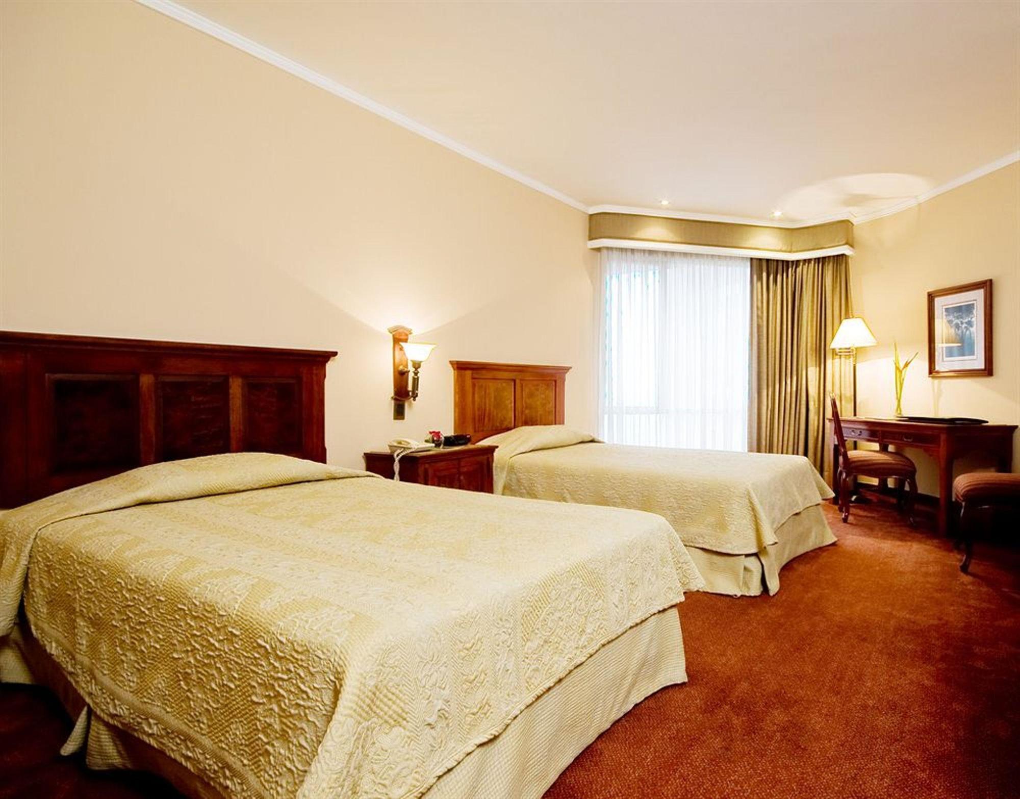 Hotel Dann Carlton Belfort Medellín Eksteriør billede A room at the hotel